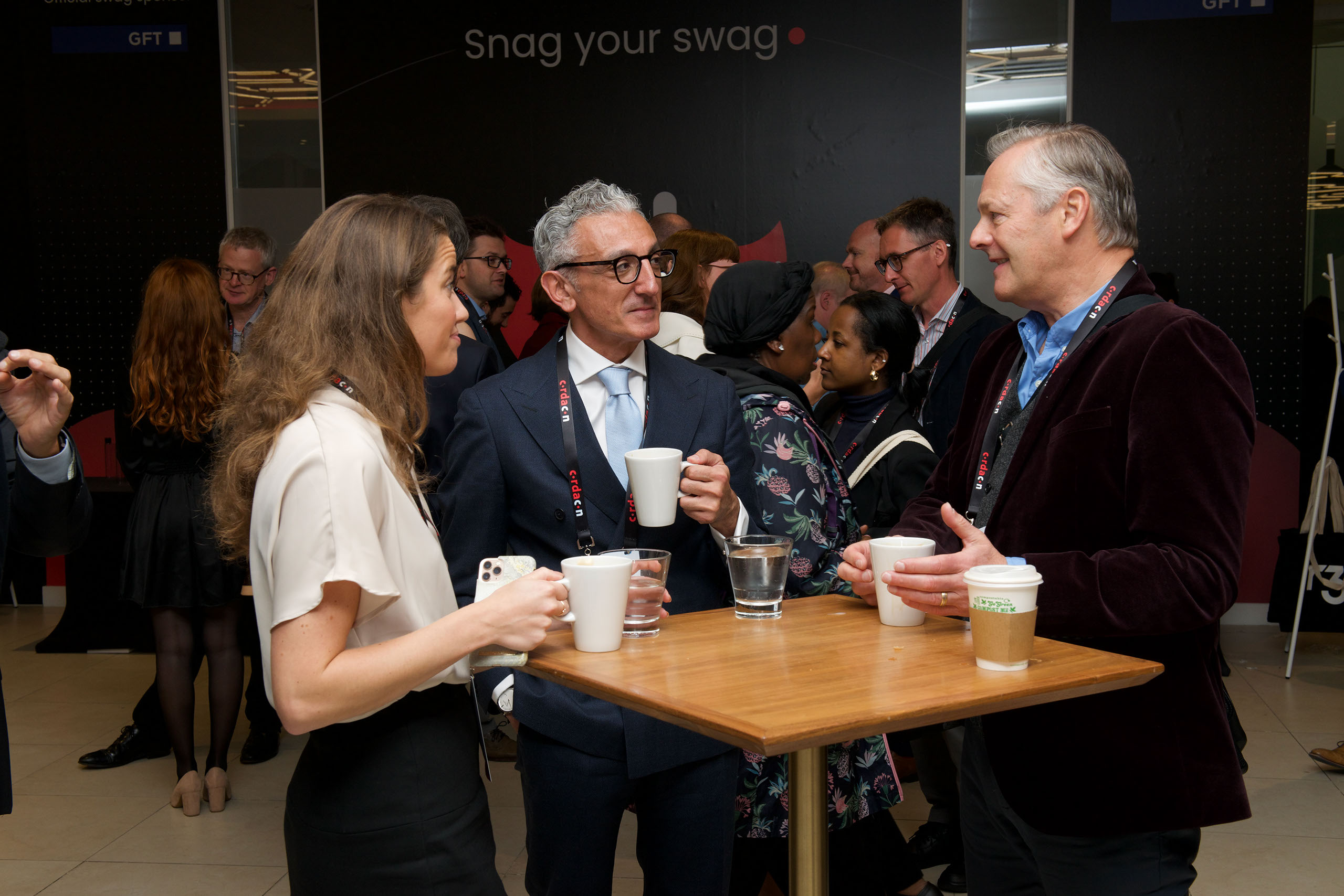 Candid — two or three people in conversation